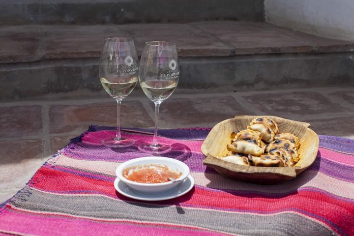Two glasses of Torrontés and empanadas